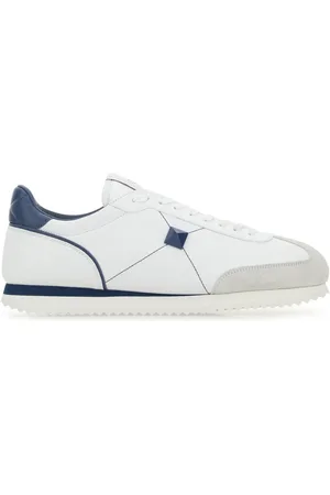 VALENTINO GARAVANI Sneakers Stud Around in pelle bianca UOMO