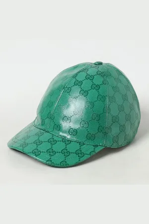 Gucci Cappello in tessuto spalmato con monogram GG all over