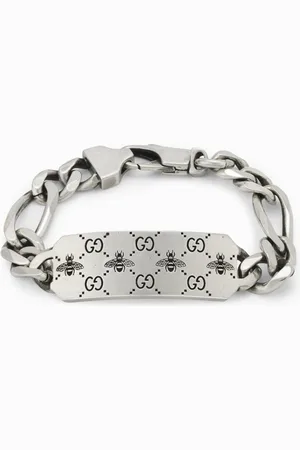 Gucci Bracciale Signature in con incisione ape e monogramm GG