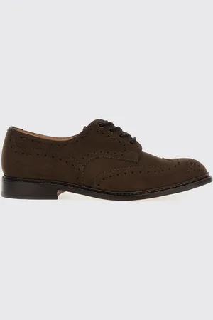 TRICKERS Derby Bourton Country in camoscio con motivo brogue