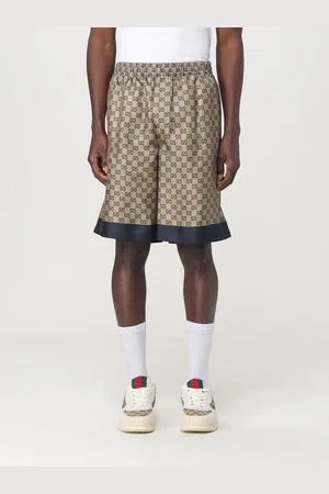 Gucci Pantaloncino in seta con stampa monogram