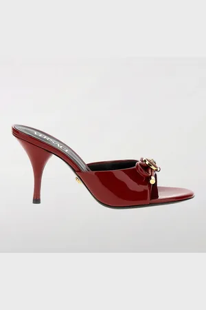 VERSACE Mules Medusa in vernice con fiocco