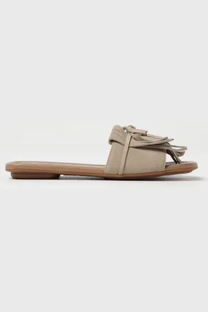 Hogan Mules in camoscio con frange