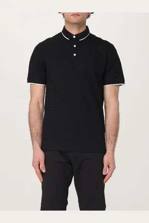 Emporio Armani Polo in cotone con logo floccato all-over