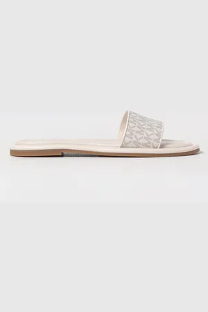 Michael Kors Mules in cotone spalmato stampa monogram MK