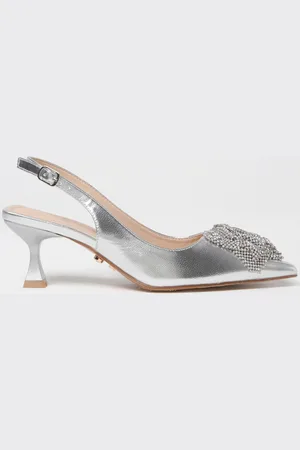 Twenty Fourhaitch Slingback Sofia in pelle laminata con fiore gioiello