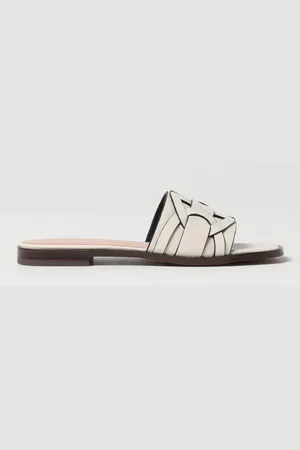 Coccinelle Mules in pelle intrecciata