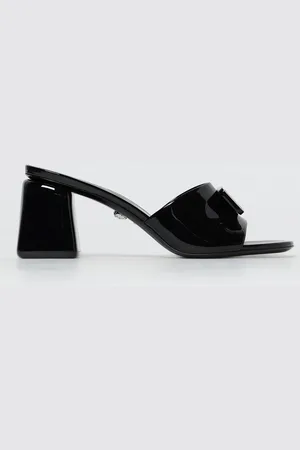 VERSACE Mules in vernice