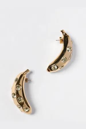 Jacquemus Orecchini Les Boucles Bananes in ottone con strass incastonati