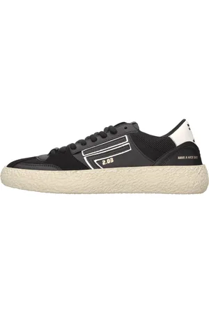 Puraai Sneakers in pelle e tessuto