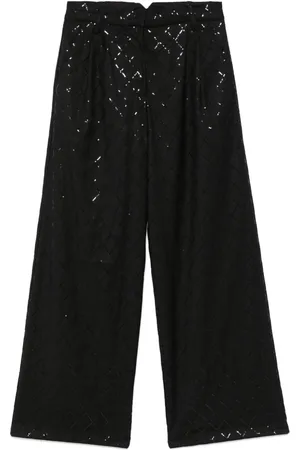 ROTATE Pantaloni a gamba ampia con paillettes