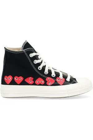 Comme des Garçons Sneaker alta Comme des Garçons Play x Converse nera con cuori rossi
