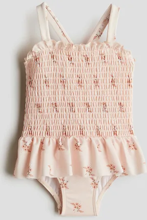 H&M Costume intero con smock