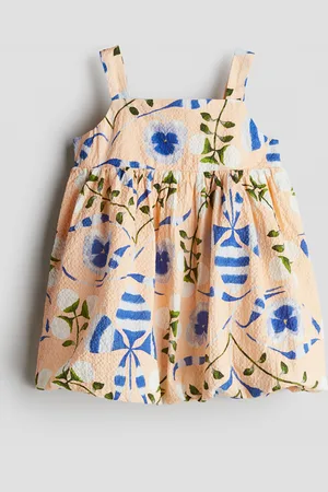 H&M Abito in seersucker con stampa floreale.