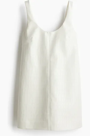 H&M Miniabito con motivo coccodrillo