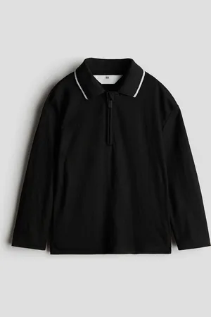 H&M Polo con cerniera