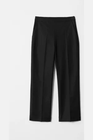 H&M Pantaloni slim con pieghe pressate