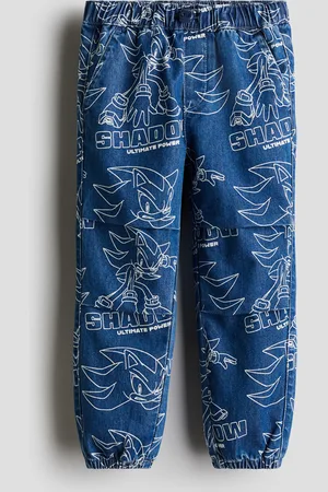 H&M Joggers in denim con stampa