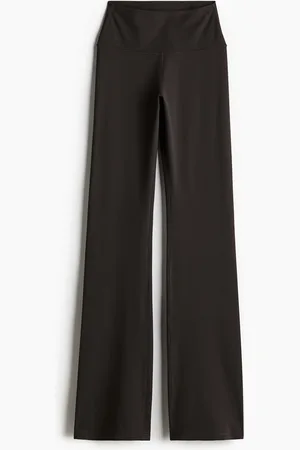 H&M Leggings da yoga svasati con SoftMove Lycra
