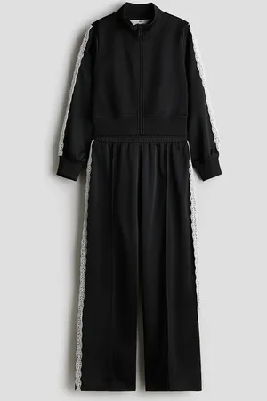 H&M Tuta sportiva con dettagli in pizzo