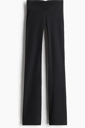 H&M Leggings da yoga svasati con SoftMove Lycra