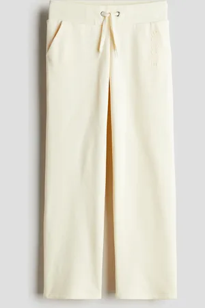 H&M Joggers con stampa in rilievo