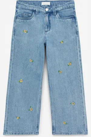 H&M Pantaloni in denim con ricami