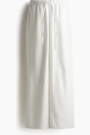 H&M MAMA Pantaloni in denim con coulisse