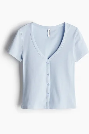H&M T-shirt a coste con bottoni davanti.