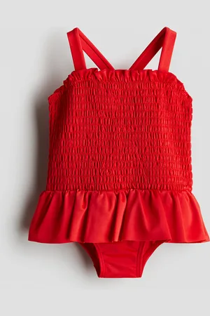 H&M Costume intero con smock