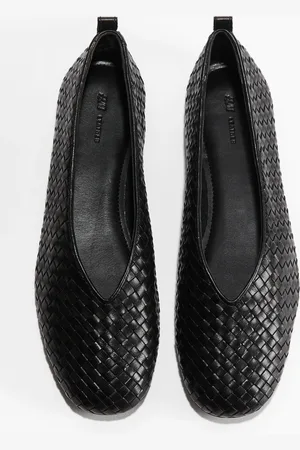H&M Ballerine in pelle intrecciata