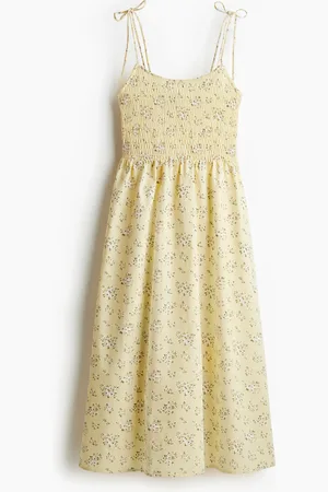 H&M Abito con smock e laccetti