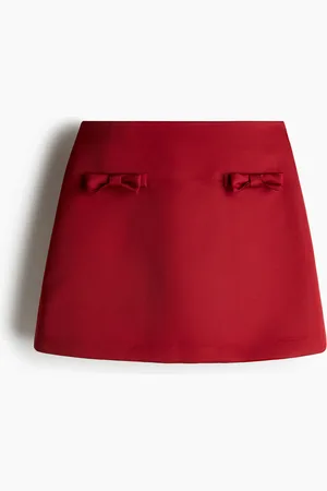 H&M Minigonna in satin con fiocchetti