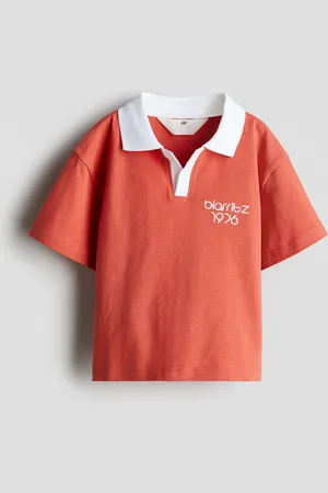 H&M Polo con ricamo