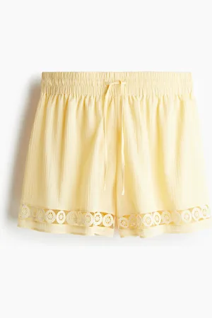 H&M Shorts a vita alta con coulisse e inserto in pizzo