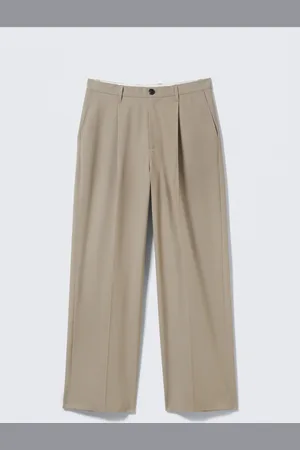 H&M Pantaloni Uno loose in tessuto per abiti