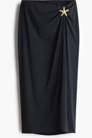H&M Pareo con stella marina decorativa