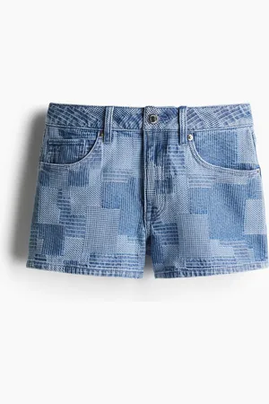 H&M Shorts in denim con motivo patchwork