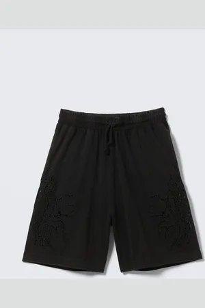 H&M Shorts loose in cotone con ricamo a punto inglese