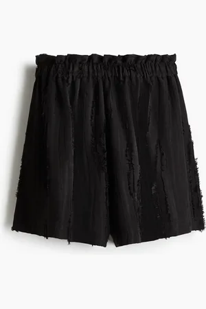 H&M Shorts sfrangiati con vita a sacchetto