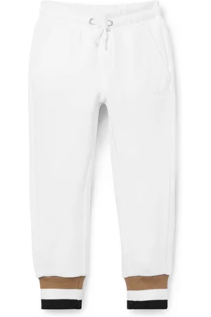 HUGO BOSS Pantaloni della tuta per bambini in cotone con righe tipiche del marchio sul fondo gamba