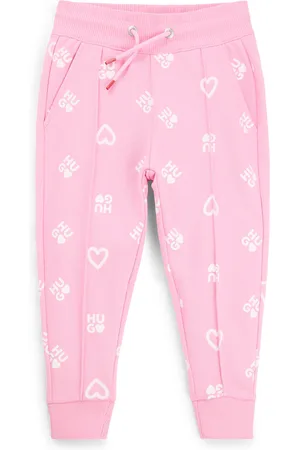 HUGO BOSS Pantaloni della tuta per bambini in misto cotone con cuori e loghi