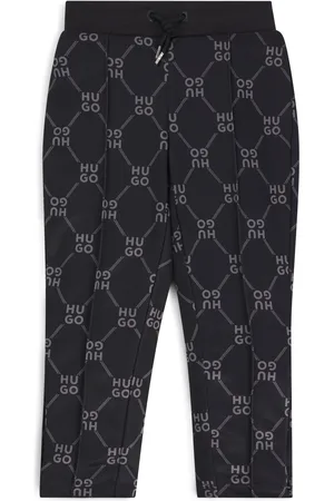 HUGO BOSS Pantaloni della tuta per bambini dal taglio morbido con logo scomposto stampato