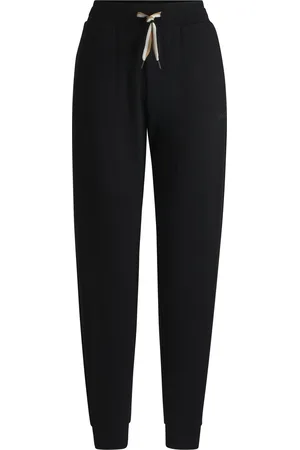 HUGO BOSS Pantaloni della tuta con fondo gamba elastico e cordoncino con righe tipiche del marchio