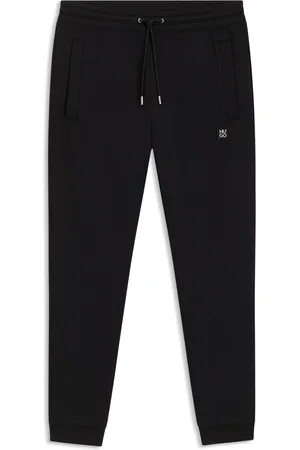 HUGO BOSS Pantaloni della tuta in misto cotone con logo scomposto