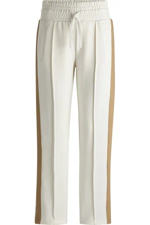HUGO BOSS Pantaloni della tuta in tessuto elasticizzat con coulisse e righe laterali