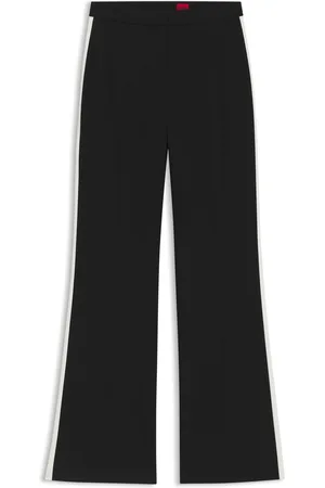 HUGO BOSS Pantaloni regular fit in tessuto elasticizzato con righe laterali