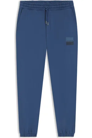 HUGO BOSS Pantaloni della tuta in terry di cotone con logo spezzato