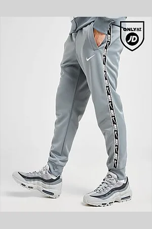 Nike Pantaloni Tape Polyknit