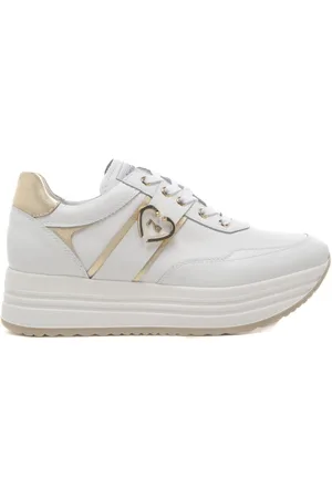Nero Giardini Sneakers da donna in vera pelle con inserto a contrasto sul retro bianche oro